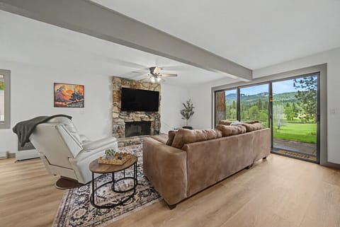 Floor-to-ceiling views of the golf course right from your living room — this is the view you came for.
