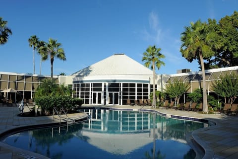 Relax with calm pool reflections and a quiet courtyard vibe.