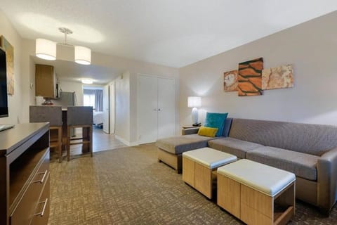 Gather together in the open lounge with cozy sectional seating.