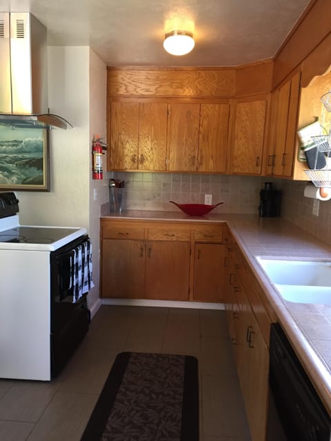 SECLUDED SPACIOUS FULLY EQUIPPED KITCHEN. 