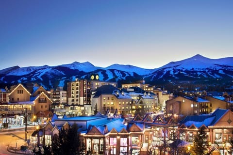 Town of Breckenridge in Winter with ski slopes behind.