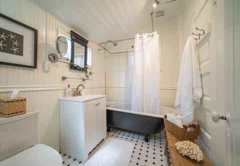 Combined shower/tub, hair dryer, towels, soap