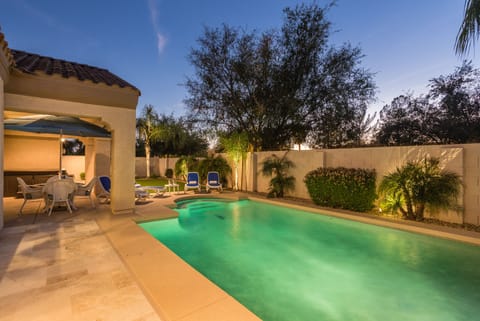 Backyard with heated Shasta Pool, Hot tub and dining table in the covered patio