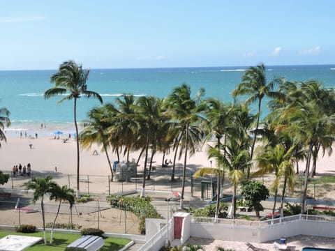 On the beach, sun loungers, beach umbrellas, beach towels