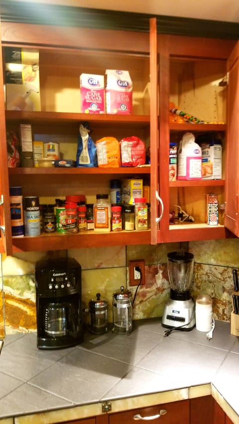 Stocked Pantry spices, flour, sugar ect. Blender Coffee maker, grinder,  presses
