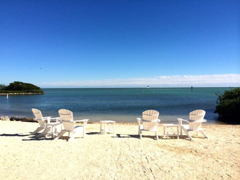 On the beach, sun loungers, beach towels