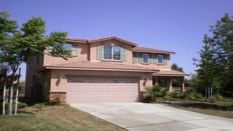 2 story home with 2 car garage & french doors on Cal-de-sac in Gated Community.