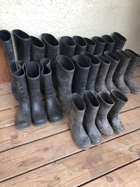 Rain Boots of various sizes to use when hiking down to waterfall and creek