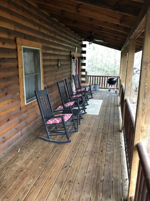 Large covered deck w/rocking chairs & ceiling fans (side upper deck)