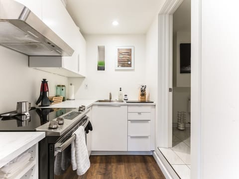 Plenty of pantry storage in a well-lit kitchen. 
