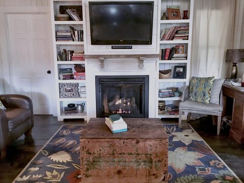 Cuddle up in front of the gas fireplace while watching your favorite movie!