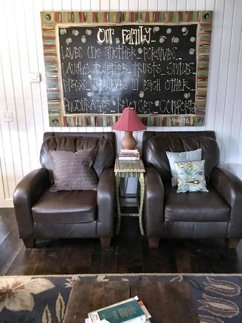 Cozy up with your special someone in these over sized, leather, comfy chairs!