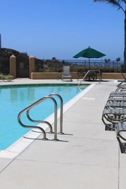 One of 2 Pools and Sea Beyond + 2 car underground parking