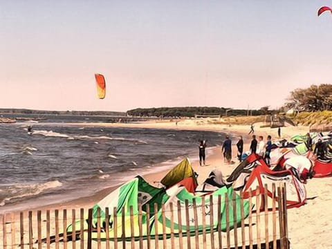 On the beach, sun loungers, beach towels