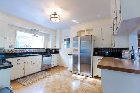 Large kitchen with easy access to the dining room and outside patio!