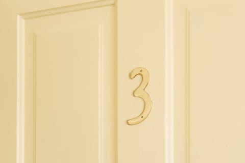 Apartment number 3 at he top of the stairs.