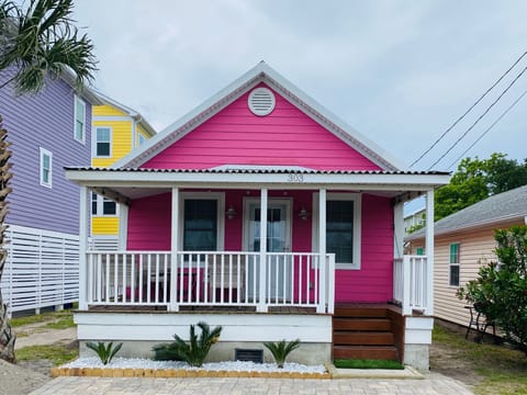The PINK house with an inviting front porch