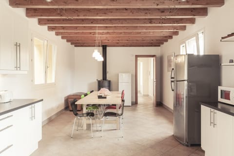 Fully-equipped kitchen and dining area.