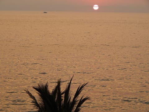 On the beach, sun loungers, beach towels