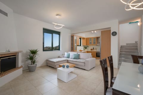Lightly open space living room with dinner area !
