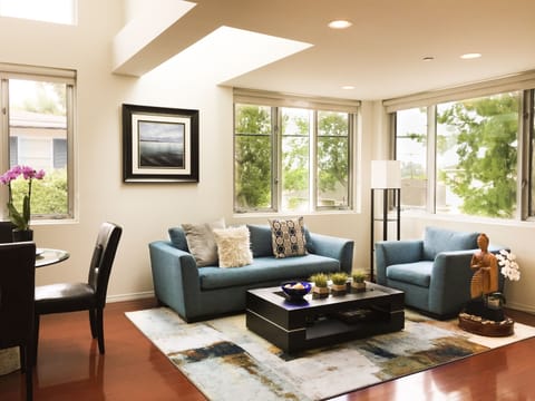 The Main Living Area is Open, Light & Spacious featuring Skylight & High Ceiling