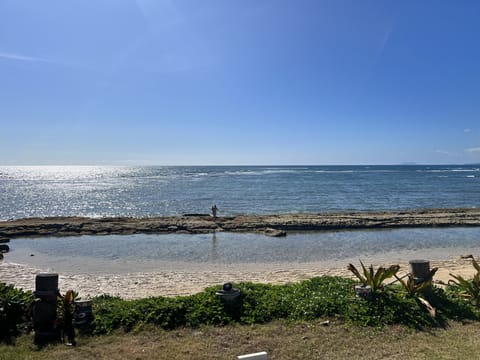 On the beach, sun loungers, beach towels