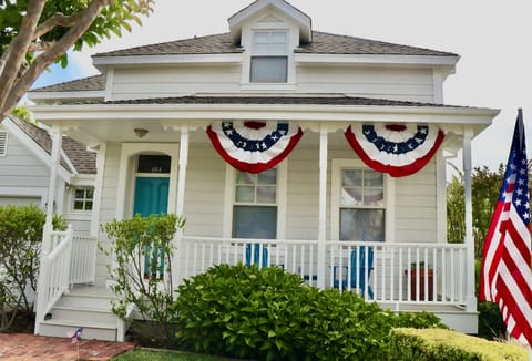 Our 1865 Victorian-Era Cottage, seen here on July 4th, 2023.