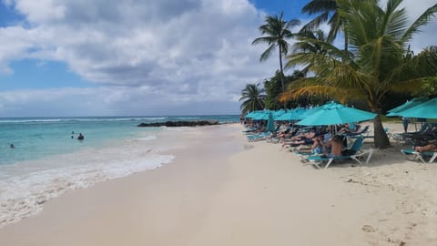 On the beach, sun loungers