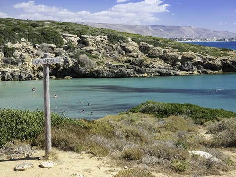 Beach nearby, sun loungers