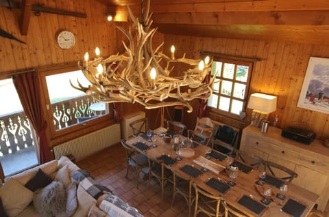 A magnificent 40-antler chandelier forms the centerpiece of the main room