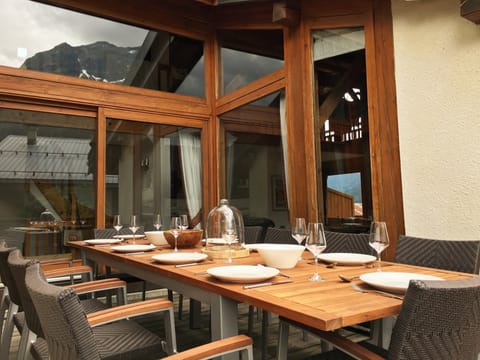 10-seater table on sunny south facing terrace with wonderful mountain views.