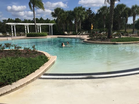 Outdoor pool, a heated pool, sun loungers