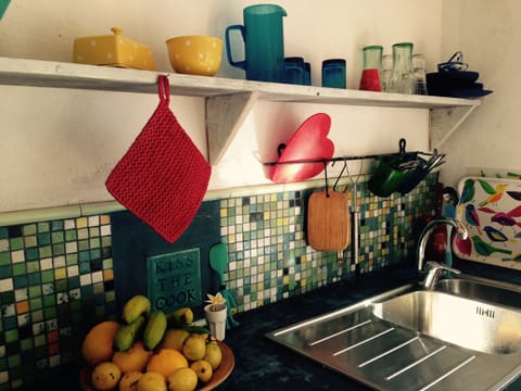 Fridge, stovetop, coffee/tea maker, highchair