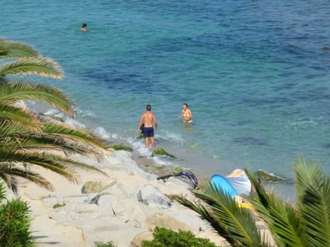 On the beach, sun loungers