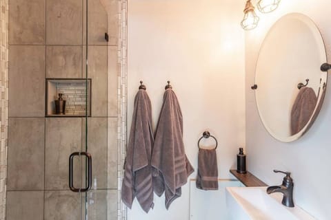 Combined shower/tub, hair dryer, towels, soap