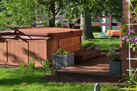 Treat yourself to a soak in the hot tub after a day on the lake and a bbq