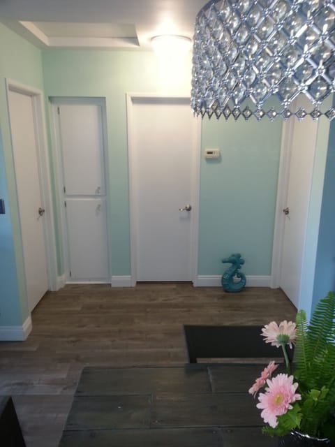 Hallway between the two bedrooms and bathrooms