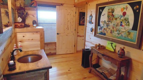 Hanging closet to the left of the window