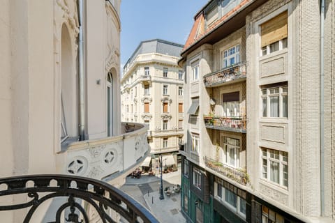 Beautiful private, sunny balcony facing the historical street.