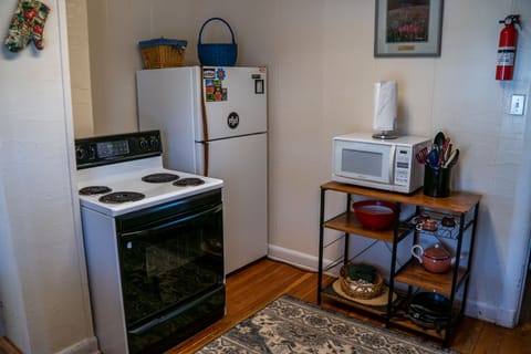 Refrigerator w freezer.  Gas Stove top with Oven.  Microwave.  