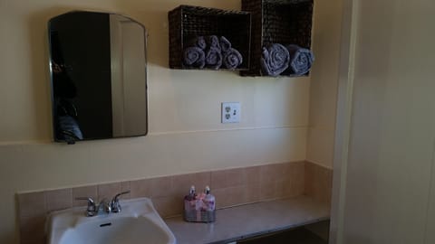 Combined shower/tub, hair dryer, towels, soap