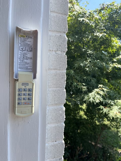 Guests enter through attached garage using a code for the keypad 