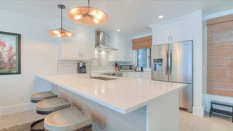 Kitchen with quartz counters and high-end stainless steel appliances