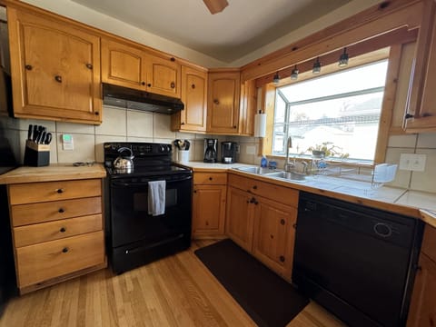 Kitchen with electric oven and range
