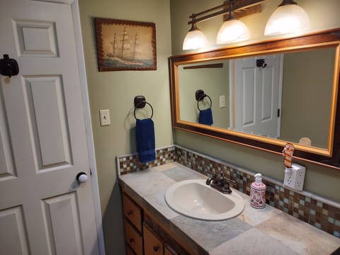 Combined shower/tub, hair dryer, towels, soap