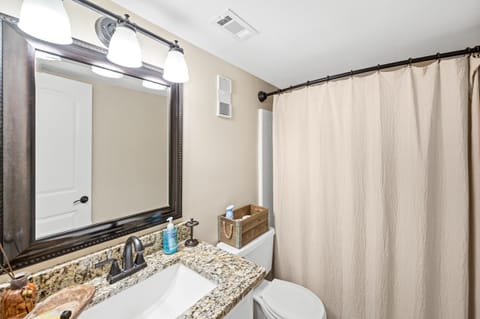 Combined shower/tub, hair dryer, towels, soap