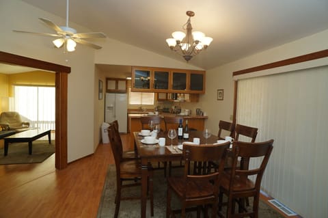 Dining Room – Pub height dining, seating for 8+, open to Living Room and Kitchen