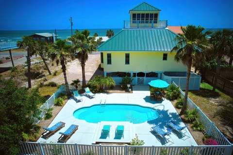 Beautiful private pool with the beach just across the street!