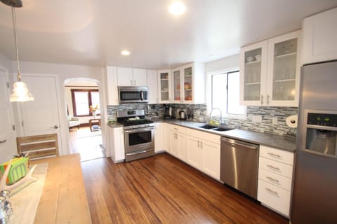 Updated, fully stocked kitchen 