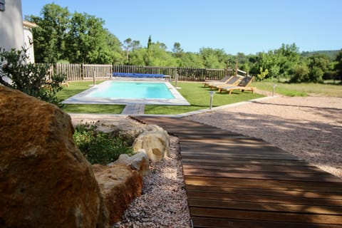 Outdoor pool, a heated pool, sun loungers